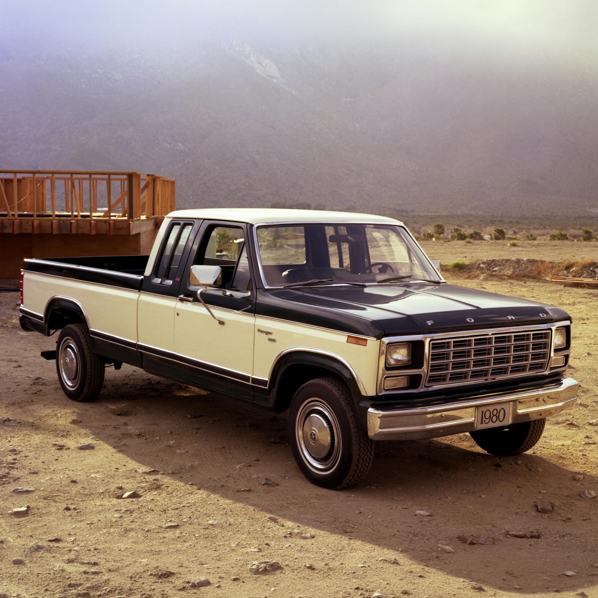 A 1980 Ford F-150 parked on a desert plain. 