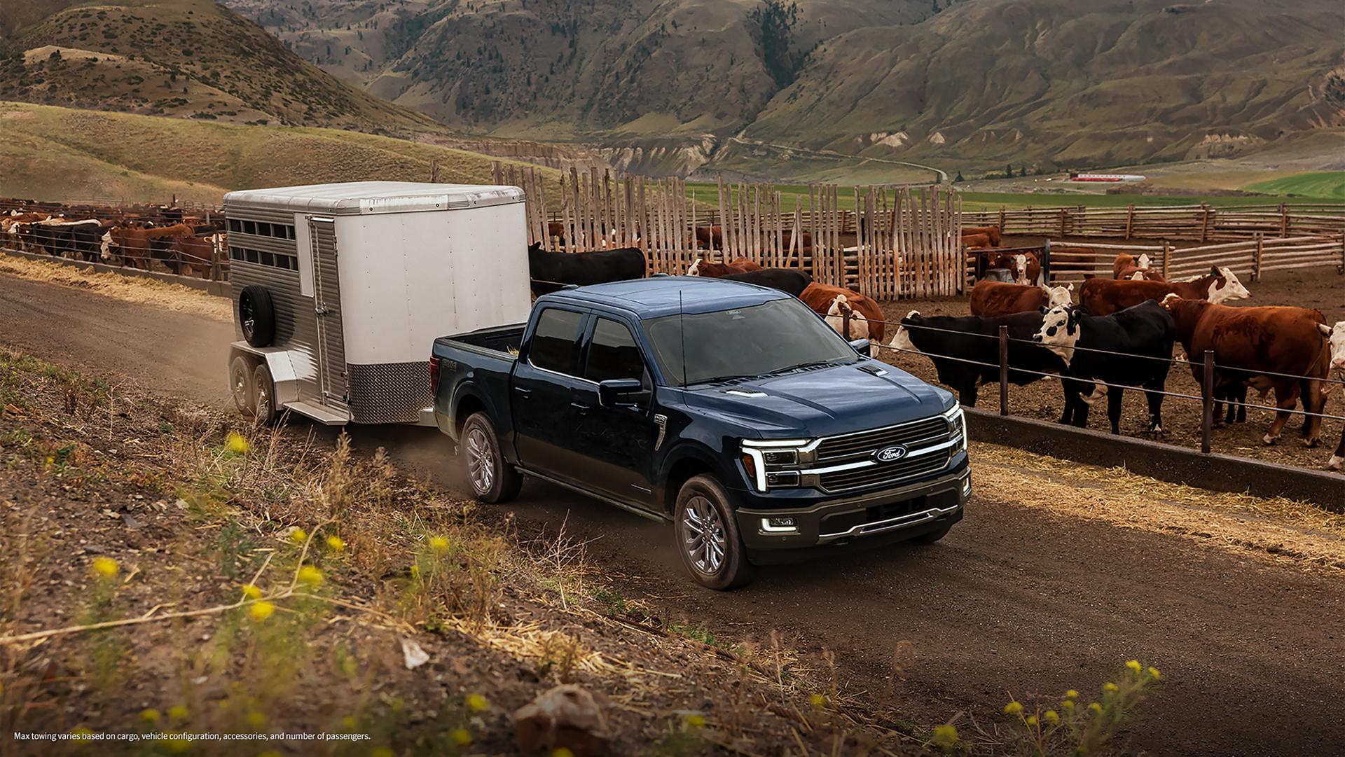 A 2026 F-150® King Ranch® model hitched to a horse trailer