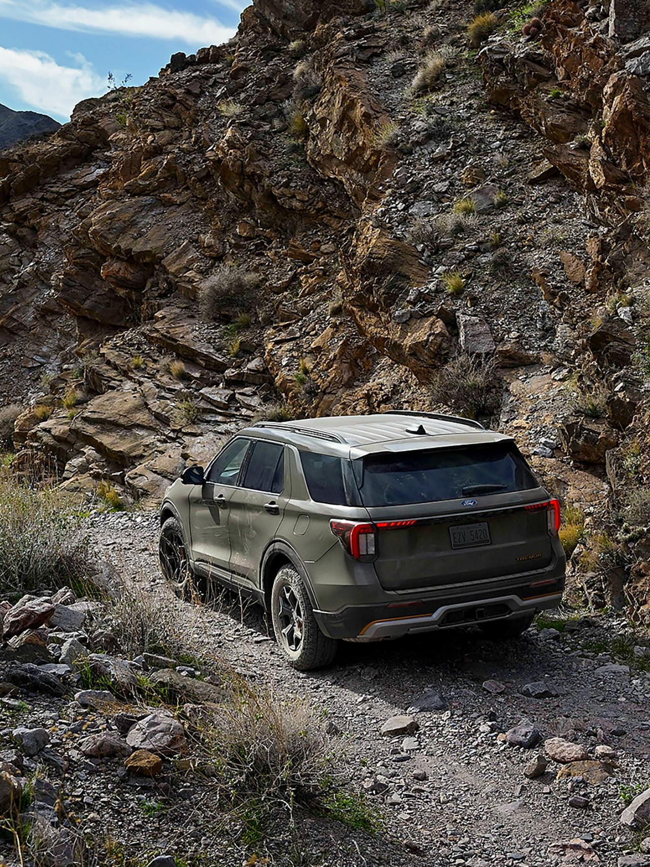 A 2027 Ford Explorer® Tremor® model parked on a muddy hillside