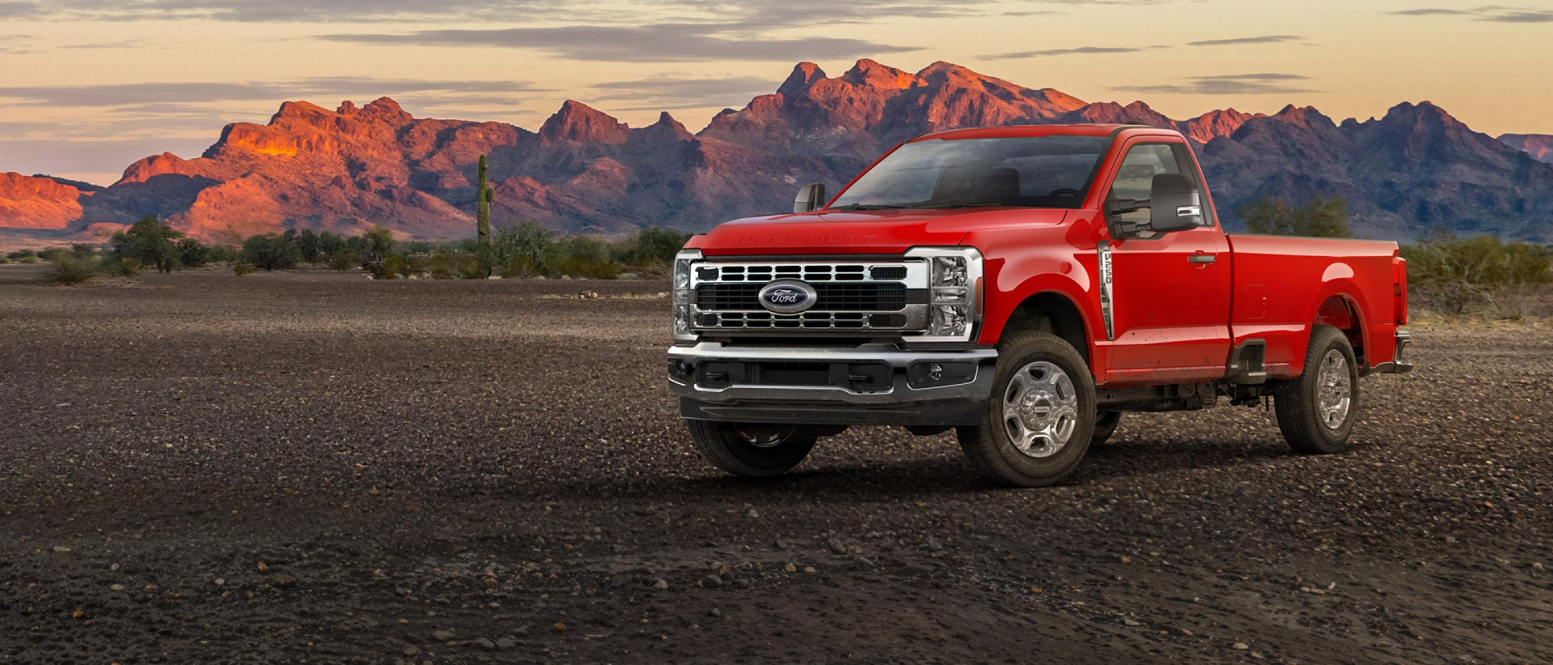 2026 Ford Super Duty® F-250® XLT truck parked on a dirt road in the mountains