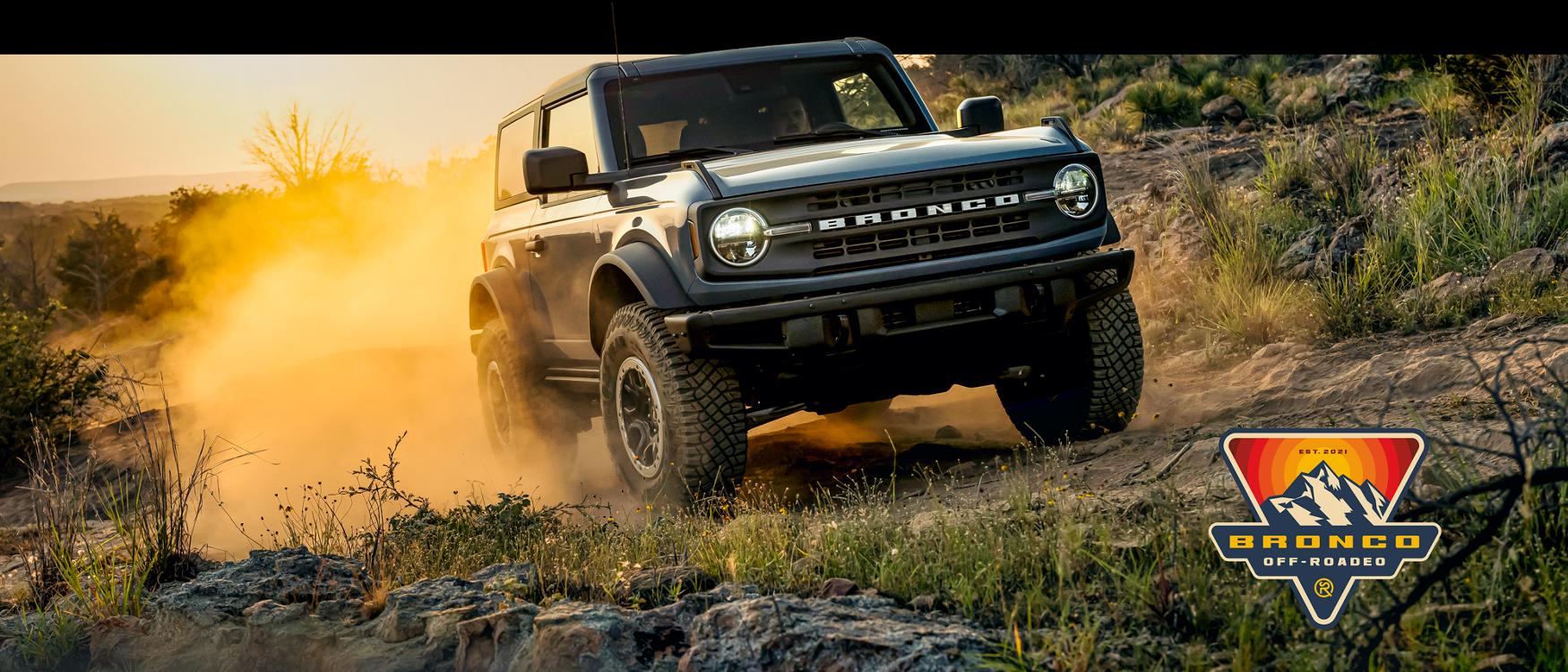 Bronco Offroadeo. A Ford Bronco climbs a rocky hillside.