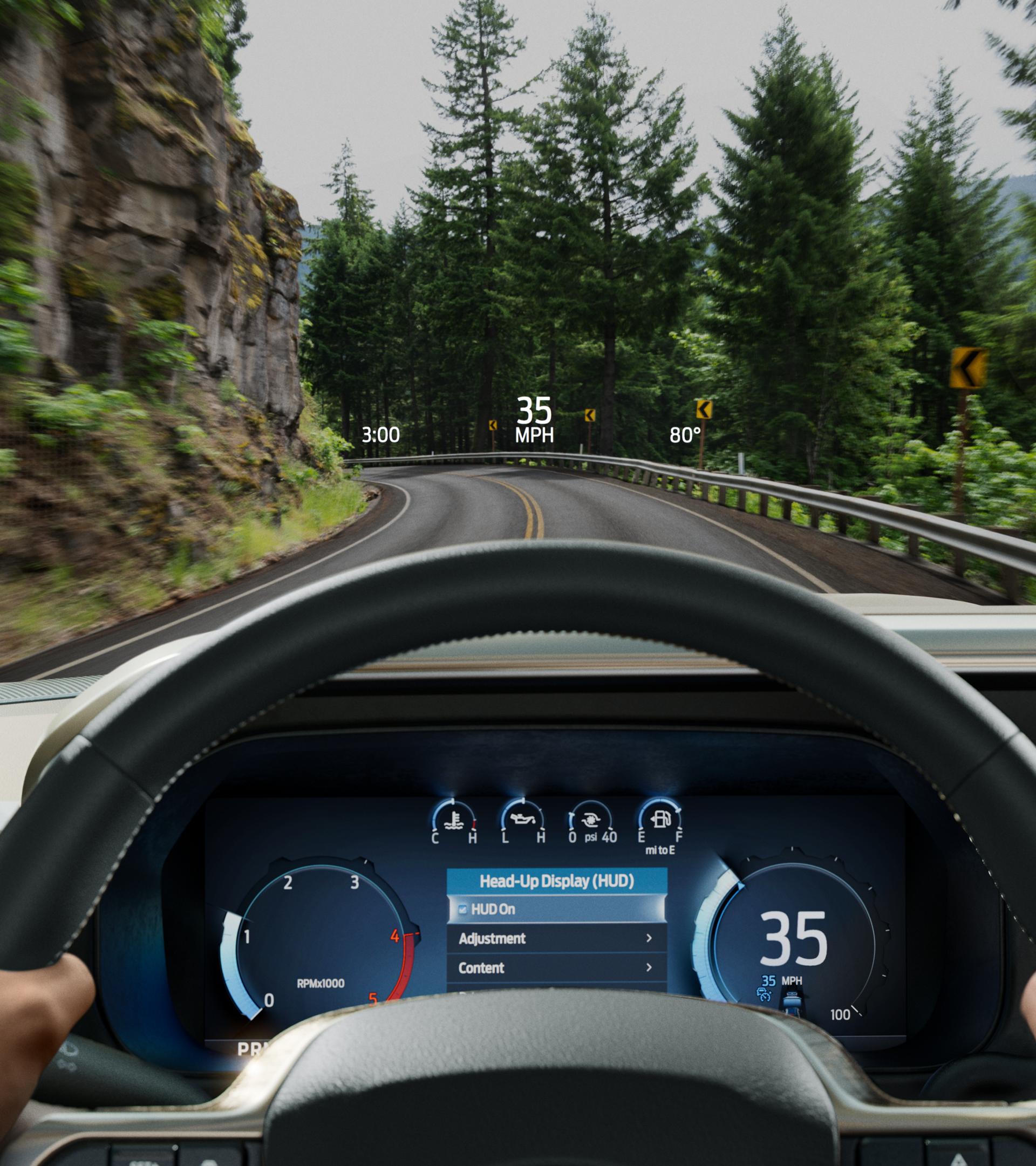 A person driving their 2026 Ford Super Duty® from their point of view, while using the head-up display feature