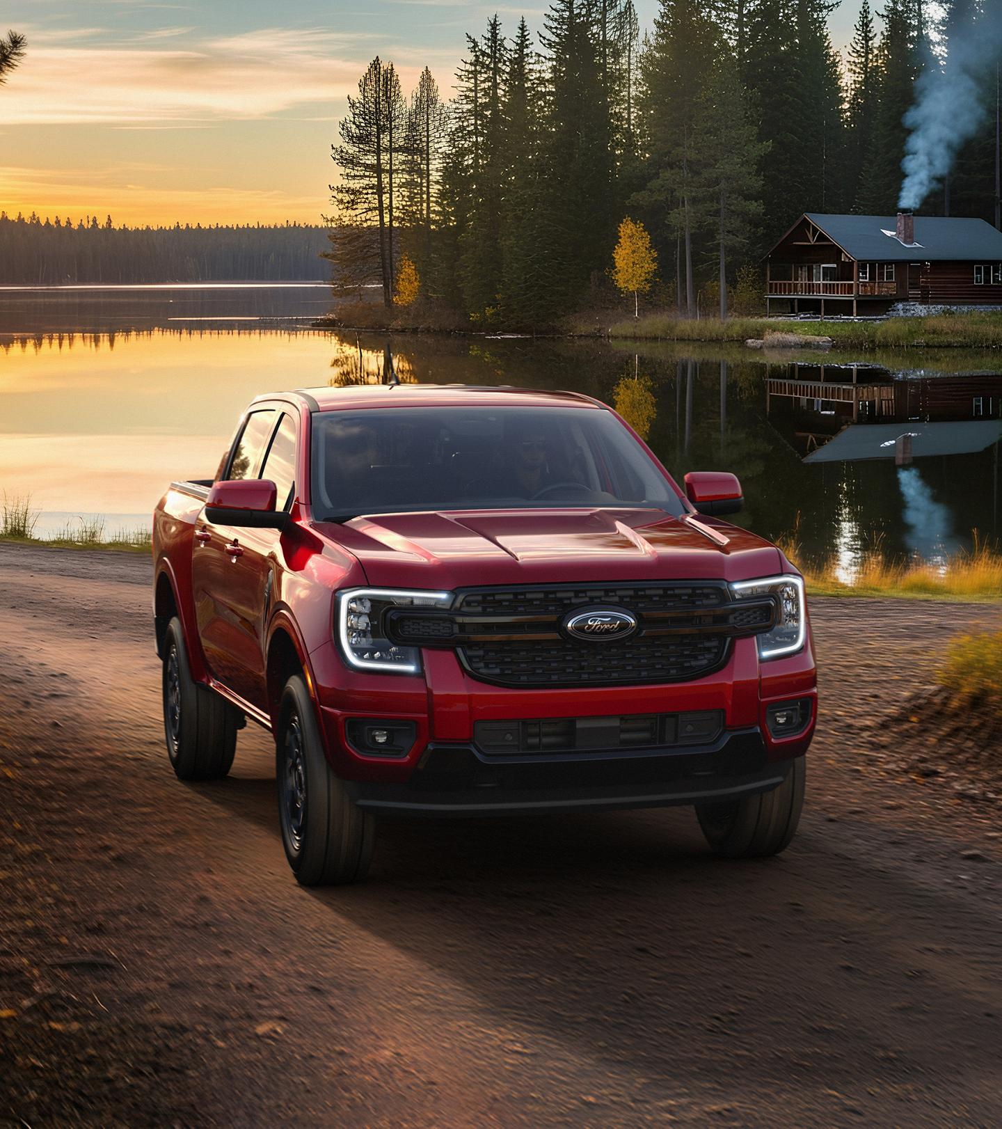 2026 Ford Ranger® Lariat® truck parked near a calm lake at dusk