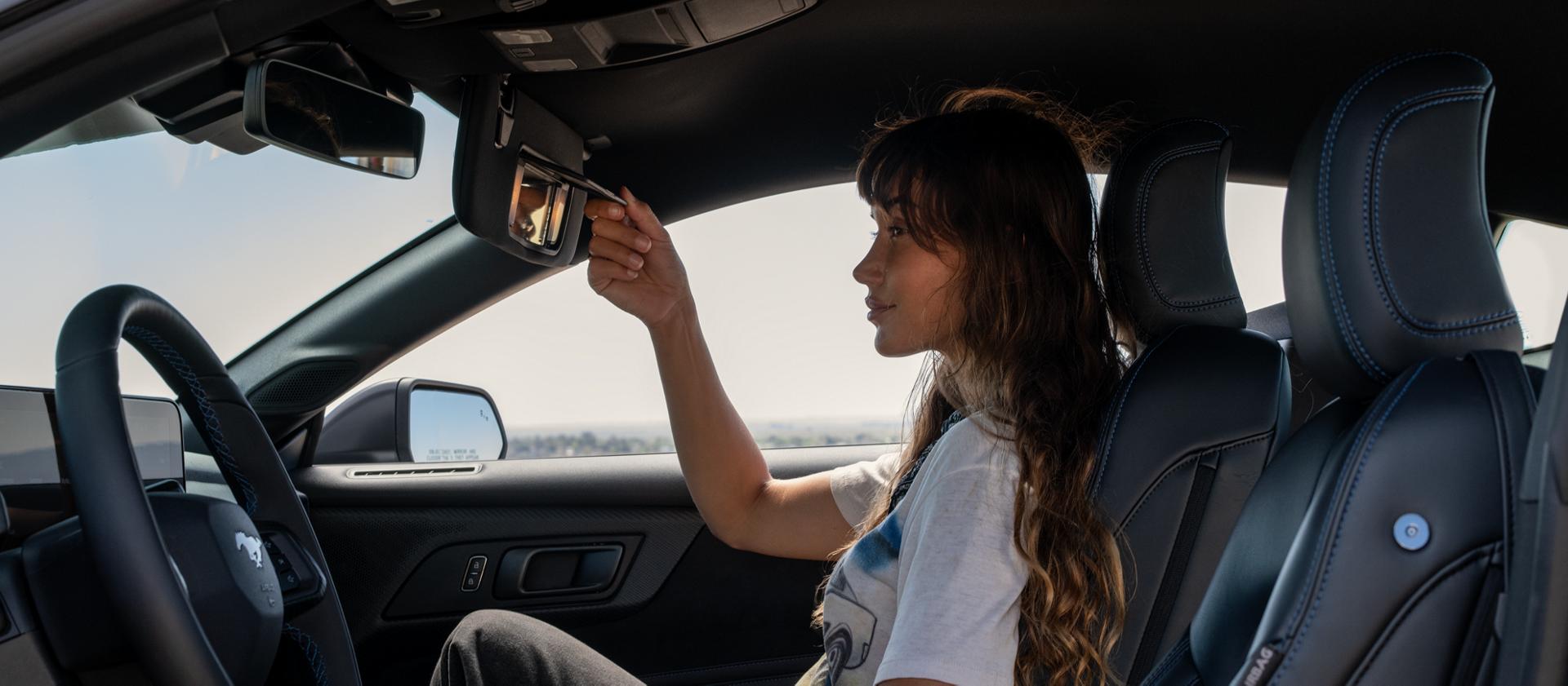 Person sitting in a 2025 Ford Mustang® Dark Horse™ coupe
