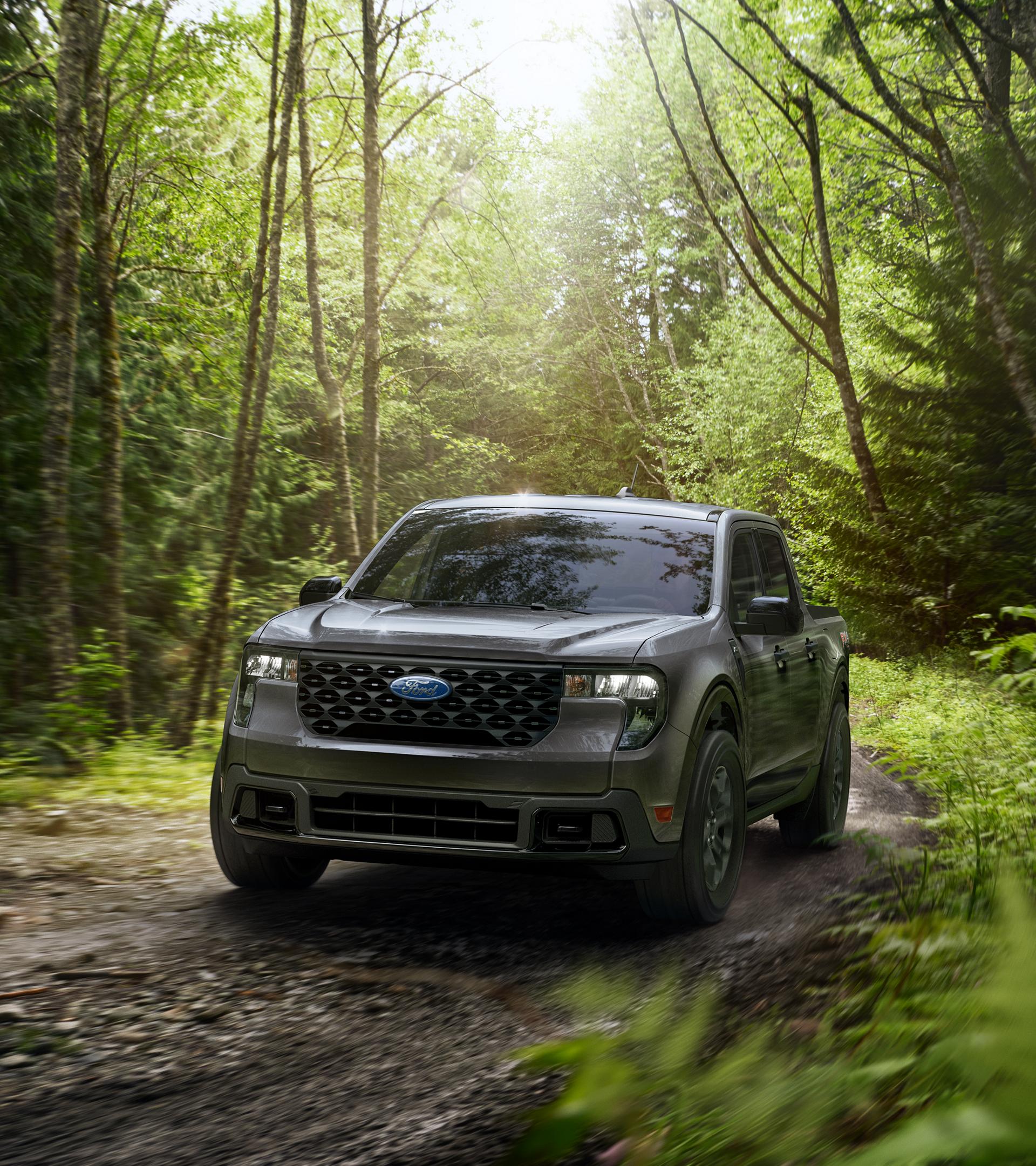 2026 Ford Maverick® pickup with the FX4® Off-Road Package model being driven through a forest