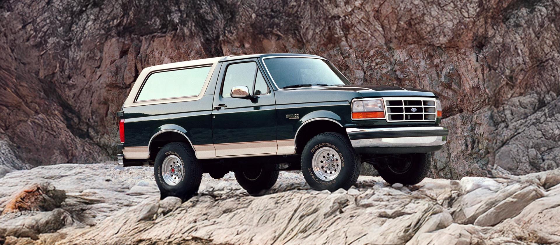 Generation 5 Bronco parked on a rocky trail.