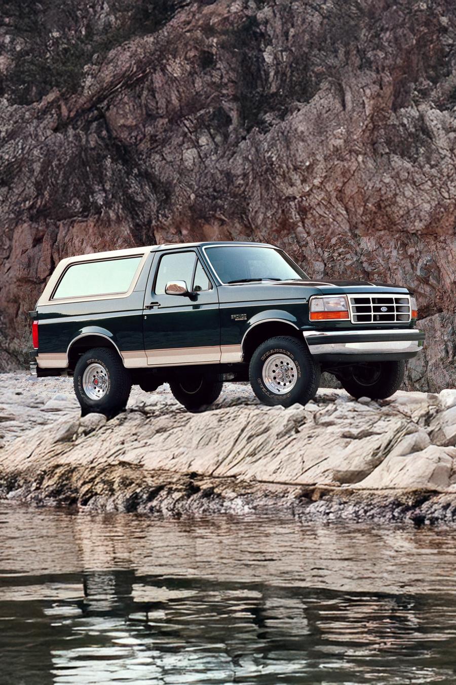 Generation 5 Bronco parked on a rocky trail.