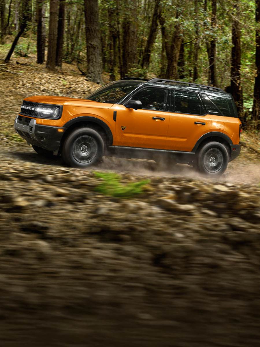 Bronco Sport® driving on a forest trail.