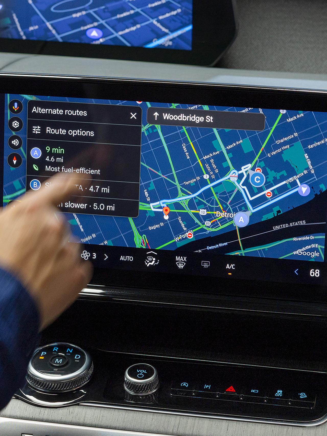 Driver using the 2027 Ford Expedition® centre display