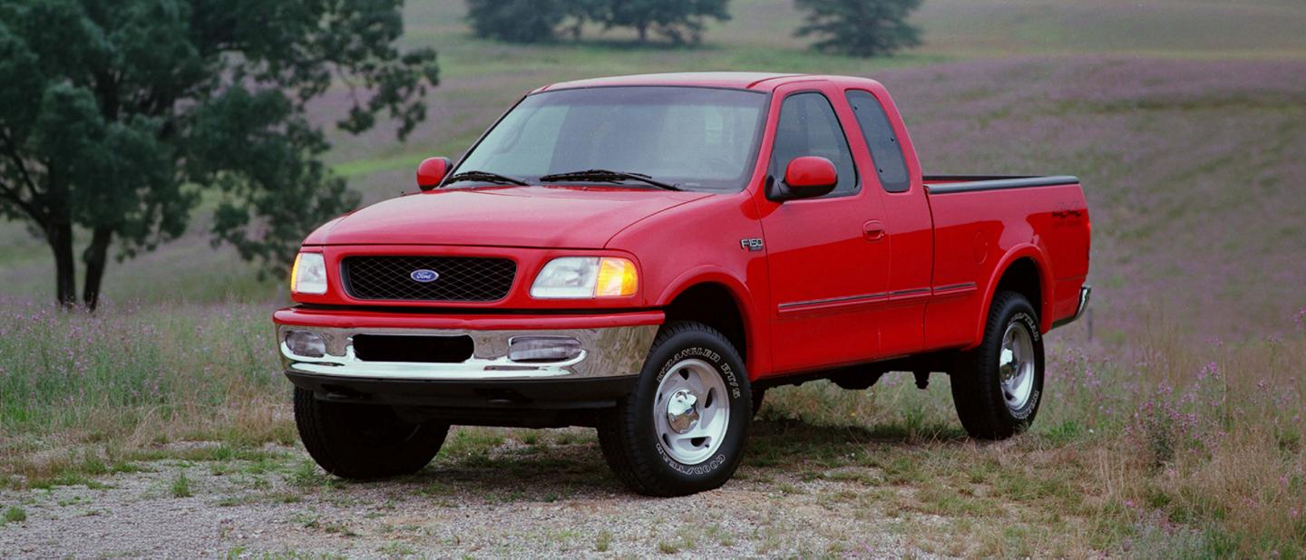 1992 F-150 parked on a gravel trail.
