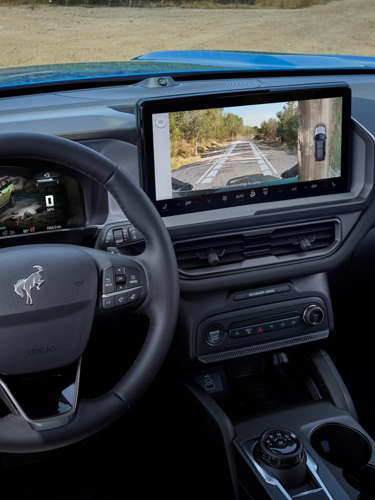 The centre display highlighting the 360-degree camera view