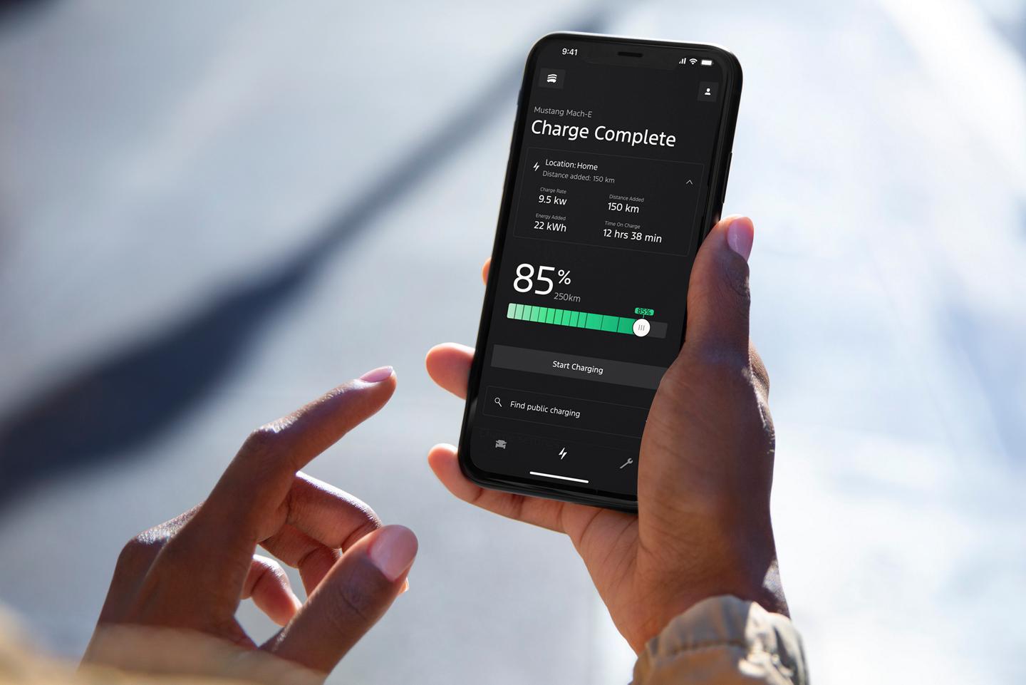A smartphone displaying a vehicle’s charge status.