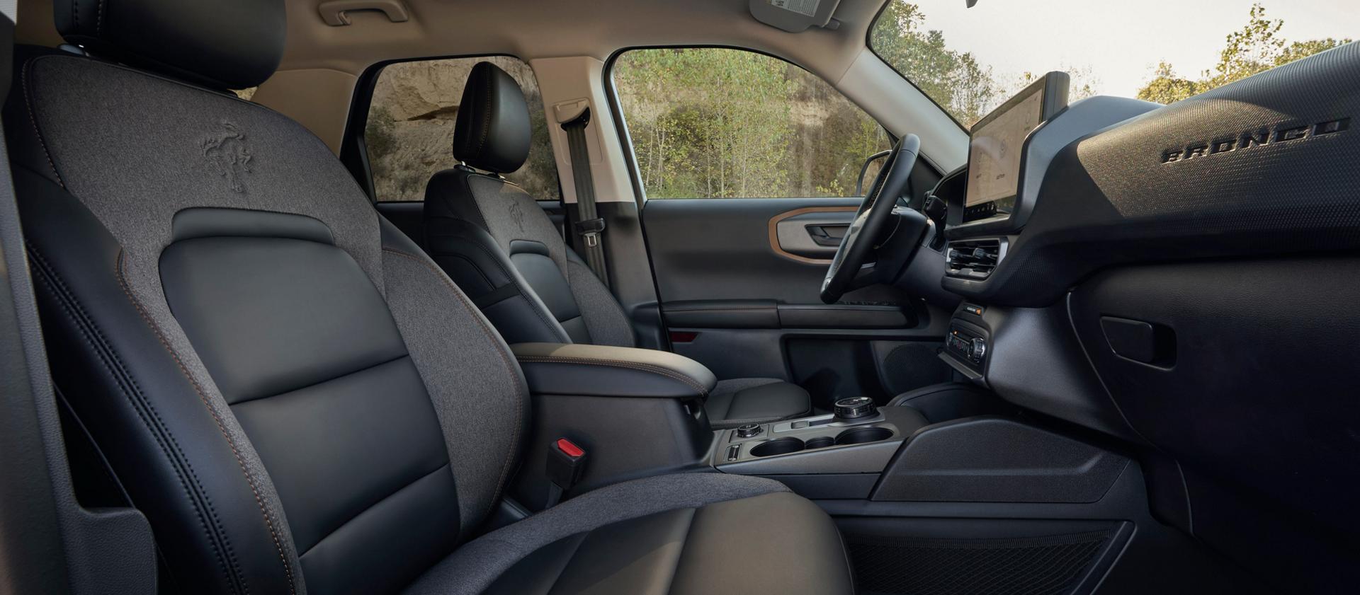 Interior of the vehicle highlighting the seating and the center display