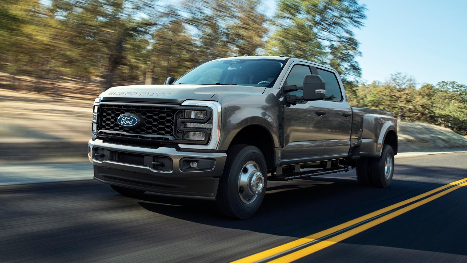 2027 Ford Super Duty® F-250® with the STX® Appearance Package driving on a paved road