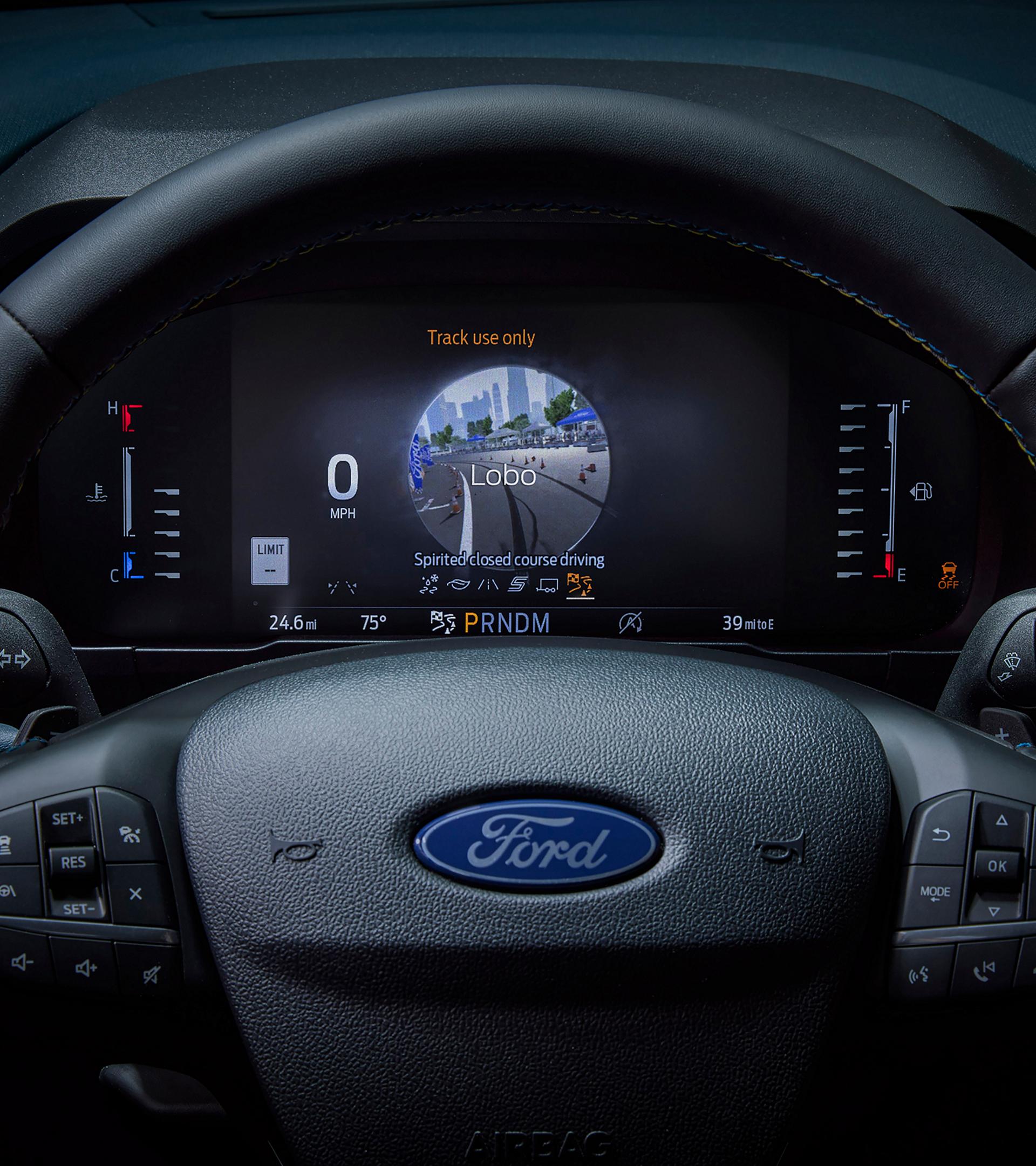 Close-up of the cluster display highlighting the drive modes