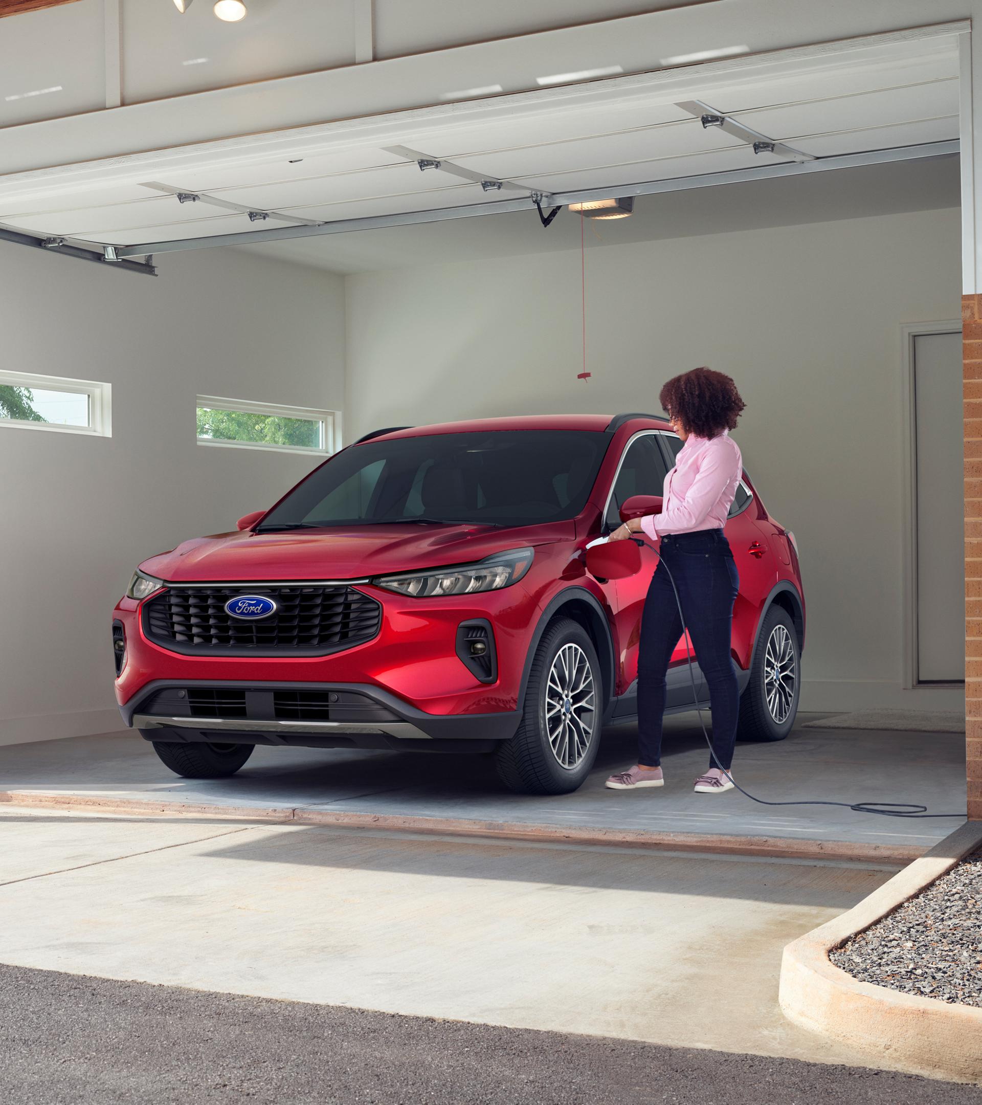 Rapid Red 2026 Ford Escape® SUV parked in a garage