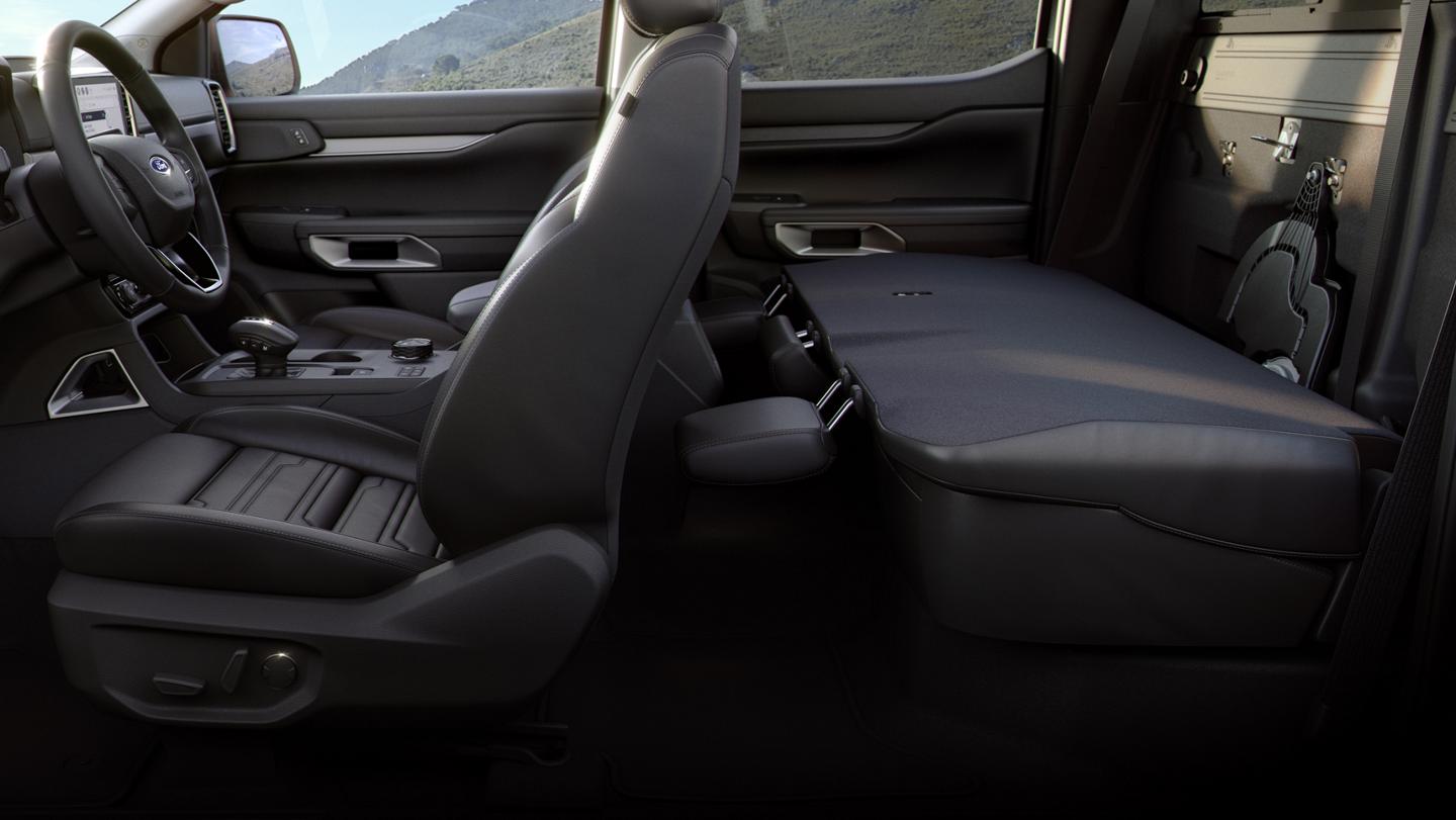 Interior view of the fold-flat seating feature inside the 2026 Ford Ranger® truck