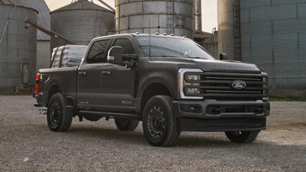 A Ford Super Duty parked at an industrial site.