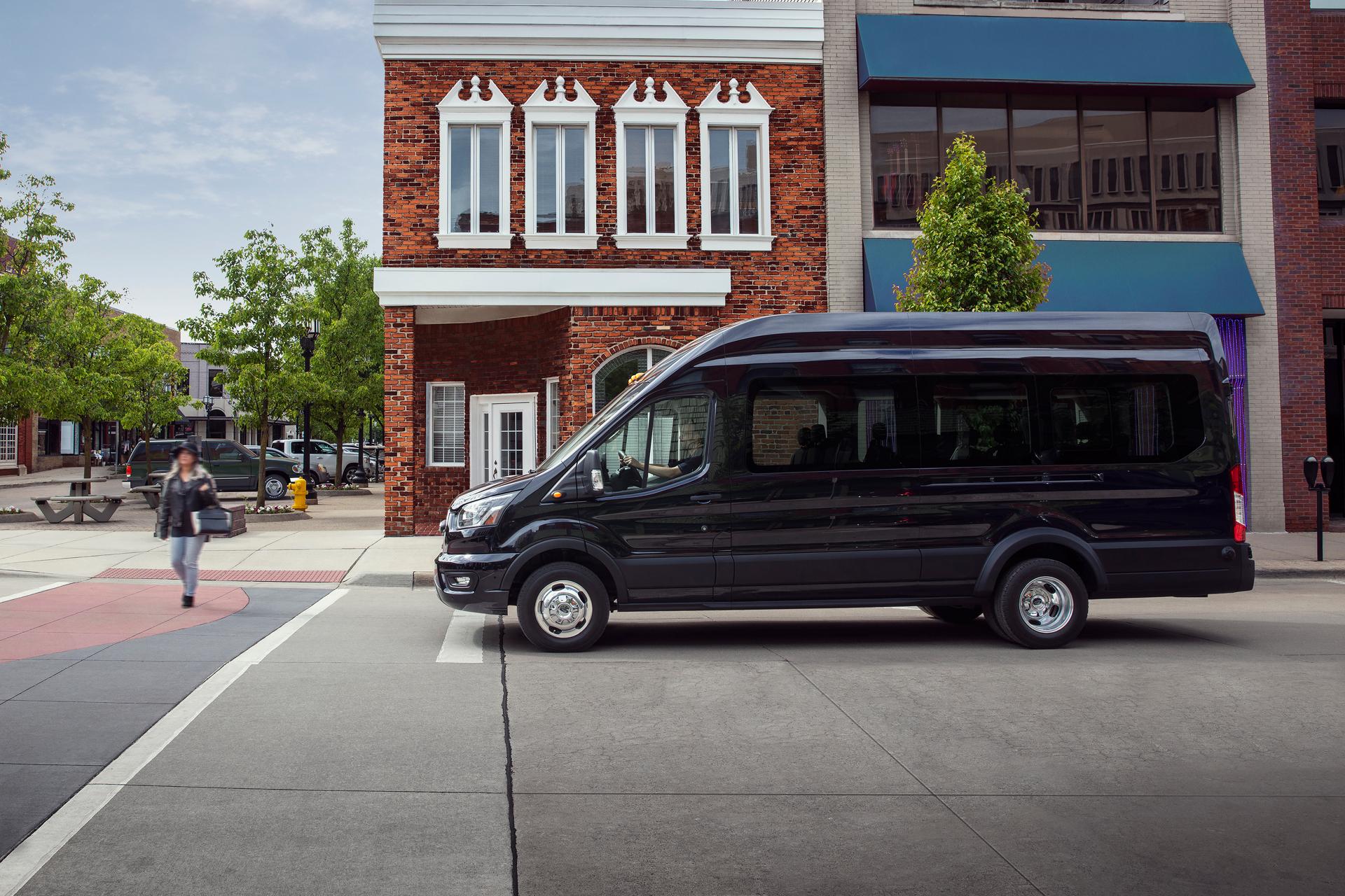 A 2025 Ford Transit® Van stopped at an intersection