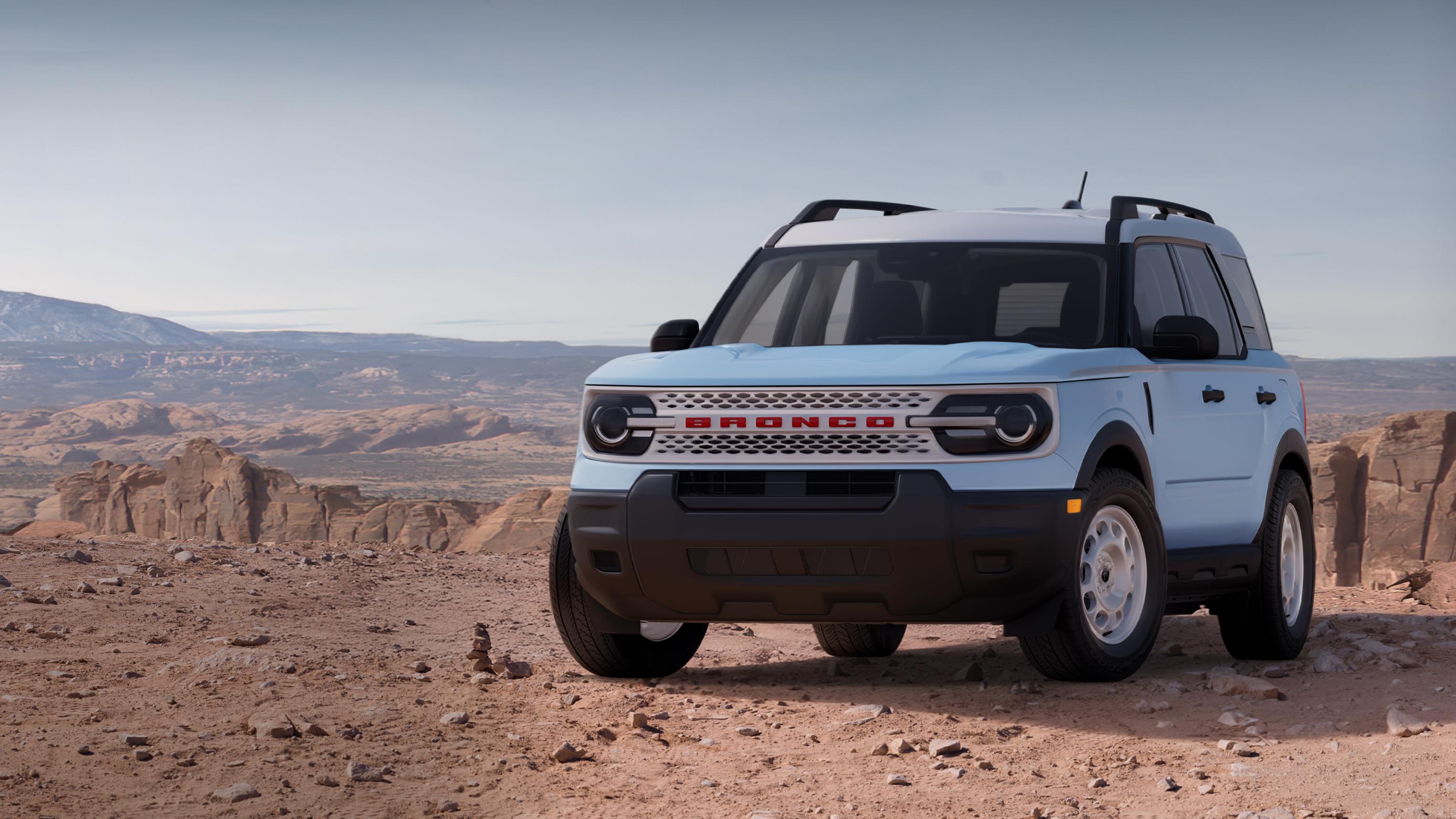 2026 Ford Bronco Sport® Heritage model parked on dirt with rocky cliffs in the background